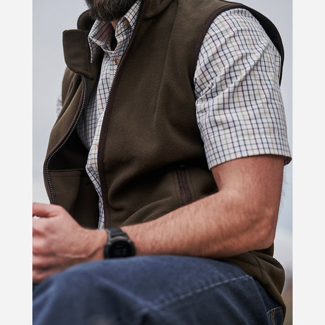 Lifestyle image of Hoggs of Fife Woodhall Fleece Gilet, Green - Wild & Moor